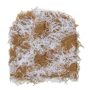 Detailed macro view of brown and white distressed knit beanie with fuzzy fringe texture
