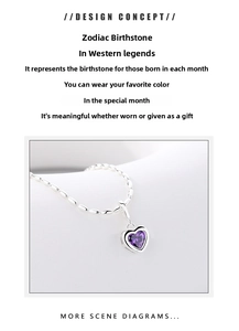 Macro shot of 925 sterling silver heart necklace with purple birthstone and ball chain