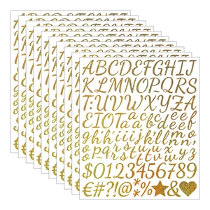 Close-up of 10 sheets of gold glitter alphabet stickers for graduation cap DIY crafts