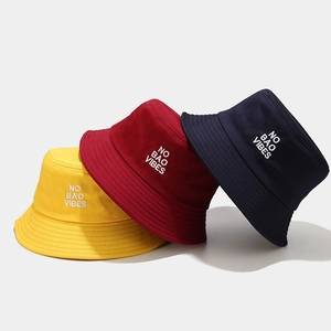 Embroidered cotton bucket hats in yellow, burgundy and navy blue colors for sun protection