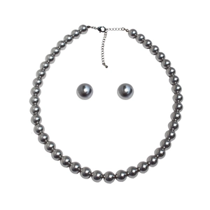 Silver grey pearl necklace and earring set with adjustable clasp on white background