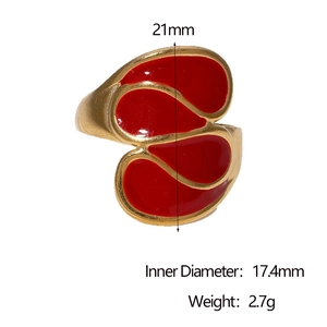 Detail view of red enamel ring with dimensions 21mm outer and 17.4mm inner diameter