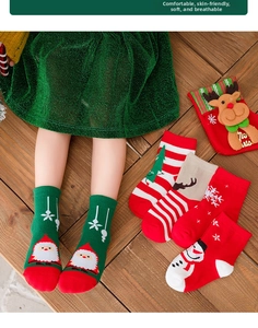 Detailed set of cotton Christmas socks with festive patterns of Santa and reindeer