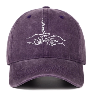 Close-up of vintage washed purple baseball cap with hands embroidery and distressed finish