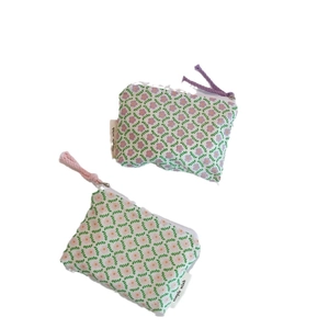 Set of two floral cotton coin purses with purple and pink patterns and zipper