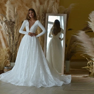Elegant white deep V-neck long sleeve wedding dress with sequins and A-line silhouette