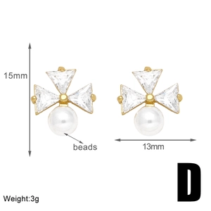 Detailed size view of 18k gold plated triangle crystal and pearl earrings measuring 15mm by 13mm