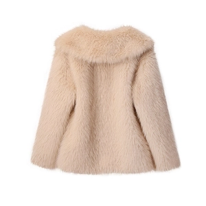Rear view of beige faux fur coat for women with soft plush texture on white backdrop