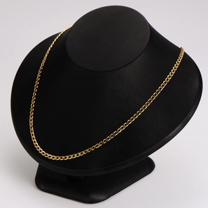 Classic gold stainless steel NK curb chain necklace displayed on a black neck mannequin
