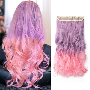 Detail view of purple to pink ombre long wavy hair extension with secure clips