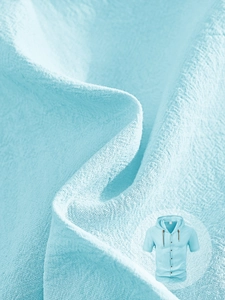 Macro shot of breathable light blue linen fabric texture on hooded short sleeve shirt