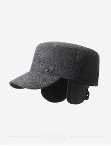 Detailed view of dark grey winter cadet hat with wool texture and warm ear flaps