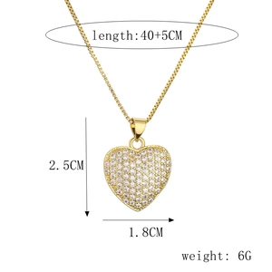 Golden heart pendant necklace with measurements 2.5cm by 1.8cm and 40 plus 5cm chain