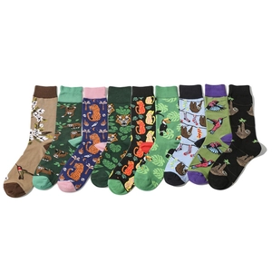 Set of 10 pairs of cotton crew socks featuring colorful animal prints and nature patterns