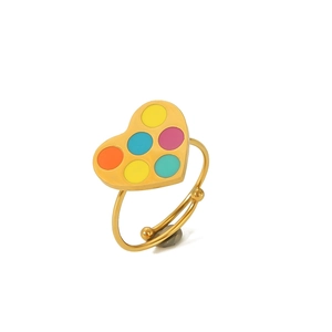 Detail of adjustable gold stainless steel ring with colorful heart shaped design