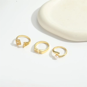 Three-piece gold-plated open ring set featuring zircon moon and pearl accents