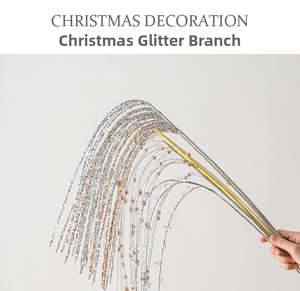 Close-up of sparkling Christmas glitter branches with silver beads for holiday decoration