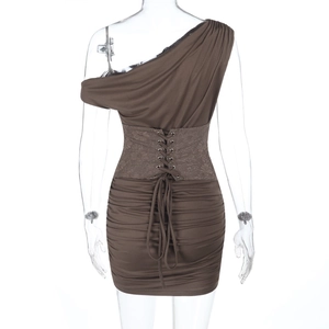 Detail of brown one-shoulder dress showing lace-up waist design and pleated knit fabric