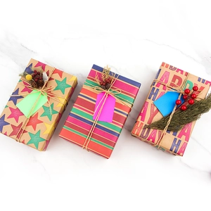 Brown kraft birthday wrapping paper with Happy Day letters and star patterns for gift boxes