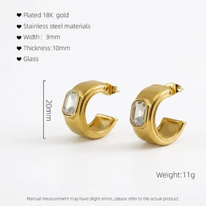 Detail view of 18K gold plated stainless steel C-shaped earrings with zircon inlay