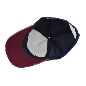 Detailed interior of vintage washed cotton baseball cap with worn edges and inner reinforcement
