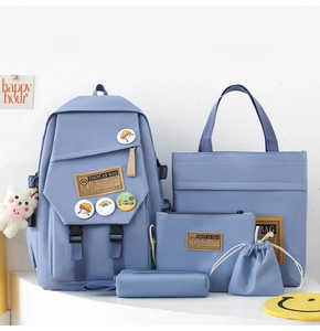 Detailed view of 5-piece nylon school backpack set in foggy blue with various matching bags