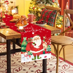 Christmas Santa Claus table runner on wooden table with festive dinner setting