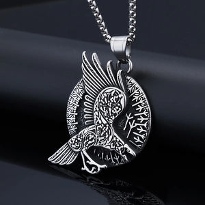 Nordic Viking raven totem pendant in stainless steel with detailed relief carvings