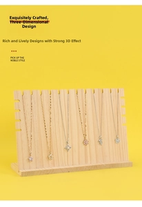 Detail view of various pendant necklaces displayed on a solid wooden stand