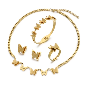 Elegant gold butterfly jewelry set including necklace bracelet earrings and ring