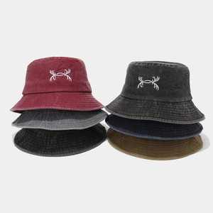 Vintage washed cotton bucket hats with antler embroidery in five retro colors