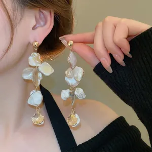 Elegant irregular shell tassel drop earrings in gold plated finish for women