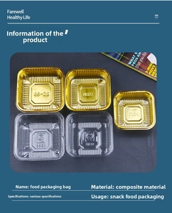 Detailed macro view of square plastic mooncake trays in clear and gold finishes