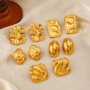 5 pairs of 18K gold plated square geometric stud earrings on beige silk fabric