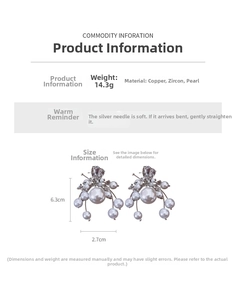 Detailed view of silver drop earrings with zircons and pearls showing 6.3cm x 2.7cm size