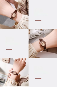 Macro view of vintage tonneau watch featuring genuine leather strap and steel buckle