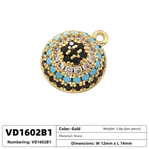 Macro shot of 12mm evil eye shell pendant in gold plated brass with blue zircon stones