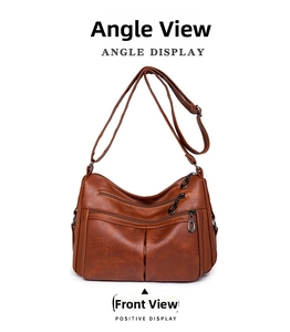 Front view of caramel brown multi-pocket faux leather shoulder bag with zippers
