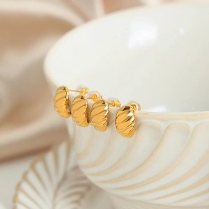 Chic twisted geometric C-shape hoop earrings in gold plated titanium steel finish