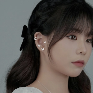 S999 sterling silver butterfly stud earrings and necklace set worn by a female model