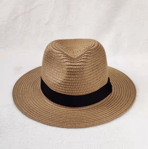 Classic khaki woven straw sun hat with black ribbon band on a soft white background