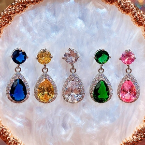 Detail of tear-drop earrings with AAA zircon stones in five vibrant color variations