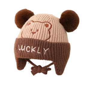 Winter knit baby bear hat with double pom poms and earflaps for thermal warmth