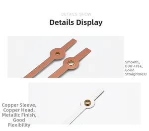 Detail of rose gold and silver clock hands with copper bushings and smooth edges