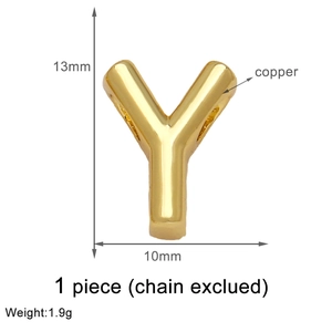 Macro view of gold letter Y pendant in copper showing dimensions 13mm by 10mm