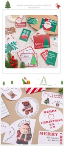 Close-up of festive Christmas gift tags featuring Santa Claus and reindeer designs