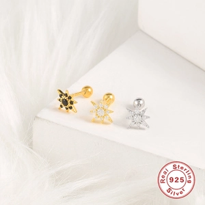 Three 925 sterling silver octagonal star stud earrings with zirconia on white pedestals