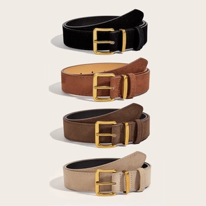 Detailed close-up of wide faux suede belts with gold buckles in four vintage colors