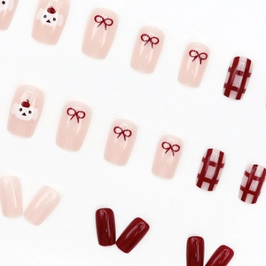 Short square press-on nails featuring red plaid pattern and cute white bear designs