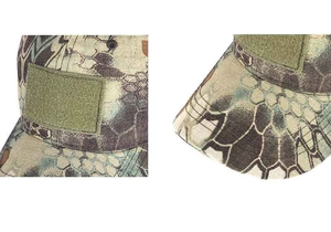 Close-up of tactical camouflage fabric texture and velcro patch design on the baseball cap